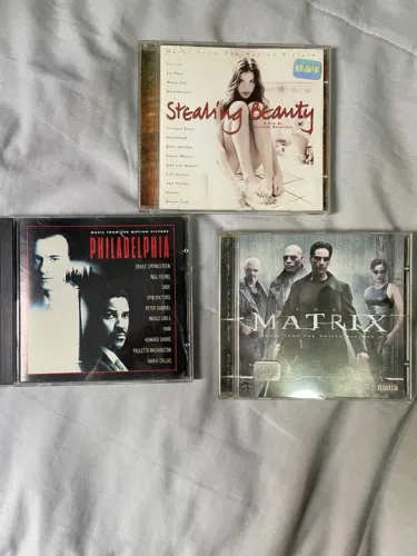 3 CDs de filmes - The Matrix, Beleza Roubada e Philadelphia