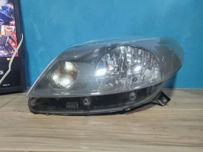 Farol Esquerdo Renault Sandero Stepway Máscara Cinza 2012 a 2014 260607548R