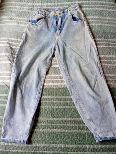 Calça Clochard em Jeans Delavê Curve seminova