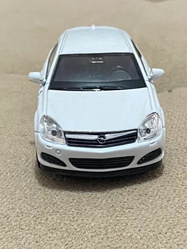 Miniatura Opel Astra GTC 2005 - Welly - Escala 1/40