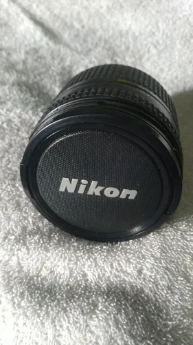 Lente da Nikon, 24-120mm, 1:3.5-5.6D, nova, com tampa traseira e dianteira.