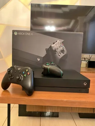 Xbox one x completo na caixa