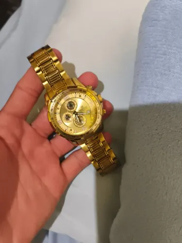 Relógio naviforce dourado