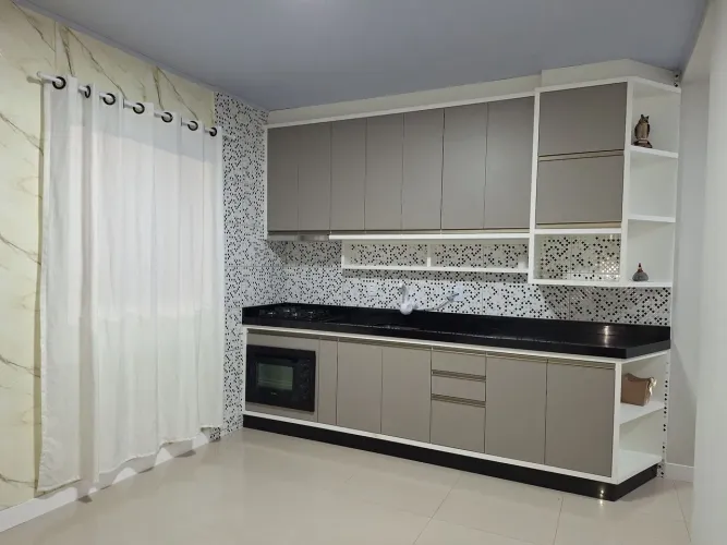 Casa no quintal compartilhado 