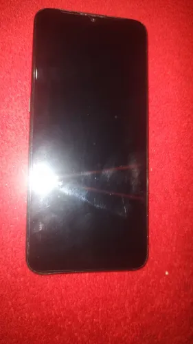 Moto E7 semi novo ... Apenas com marcas de uso atrás