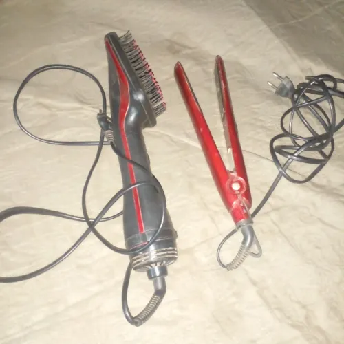 Uma escova secadora e chapinha