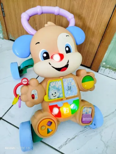 Andador musical da marca Fisher price 