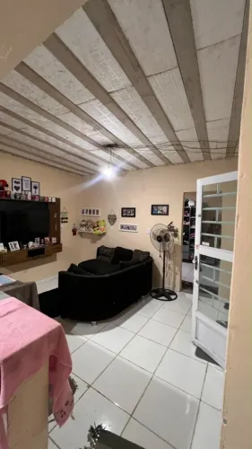 casa de um quarto uma sala cozinha americana um banheiro