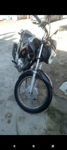 Vendo moto Semi nova,bem conservada,quitada.