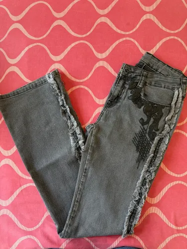 Calça tassa feminina