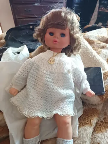 Boneca mamadinha  estrela antiga .
