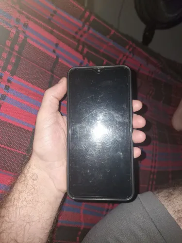 Celular A 10S muito conservado com caixa e nota fiscal e carregador original.