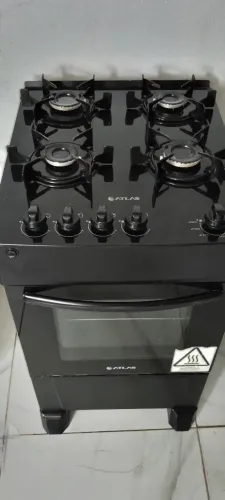 Fogão atlas mesa de vidro, funciona às 4 bocas e o forno elétrico