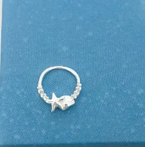 Piercing em prata 925 concha e estrela do mar 