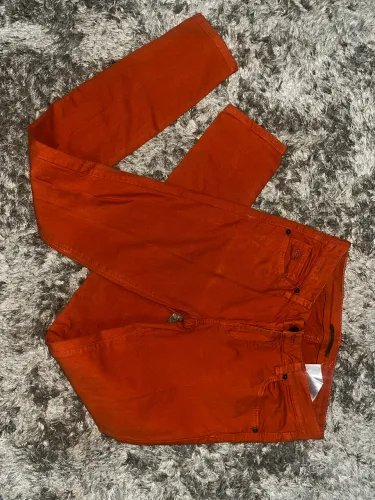 calça lacoste cor telha 