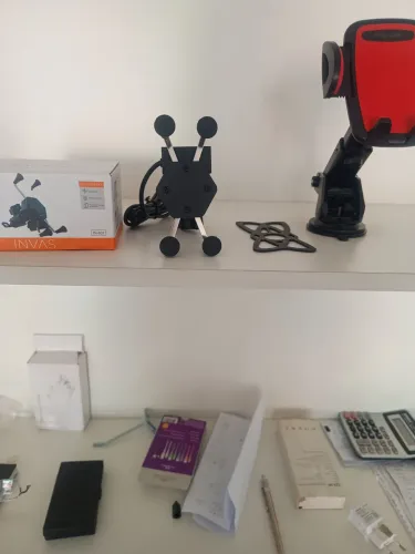 Suporte celular para moto com carregador tipo aranha novo na caixa