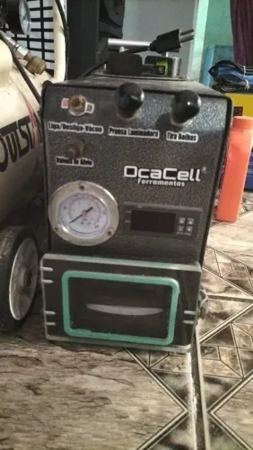 Máquina de trocar vidro Oca Cell e bomba a vaco.