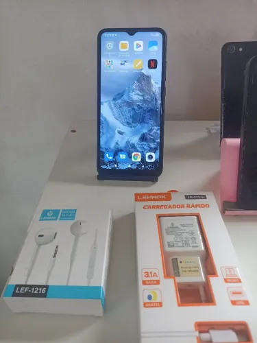 Celular Redm 9A//32 gigas carregador turbo e fone de ouvido novo 