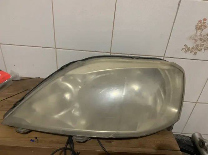 Farol completo Logan 2011 lado do motorista 