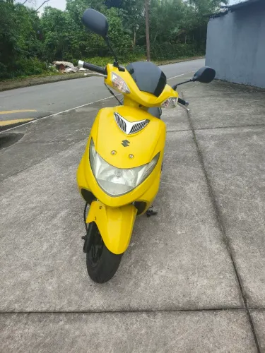 BURGMAN 125 CARBURADA