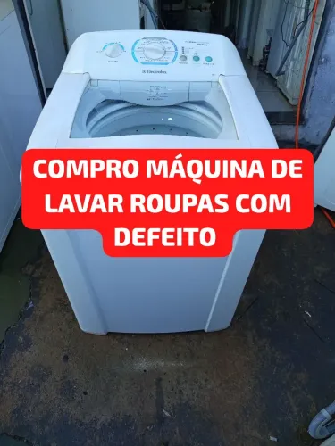 Máquina de lavar roupas com defeito