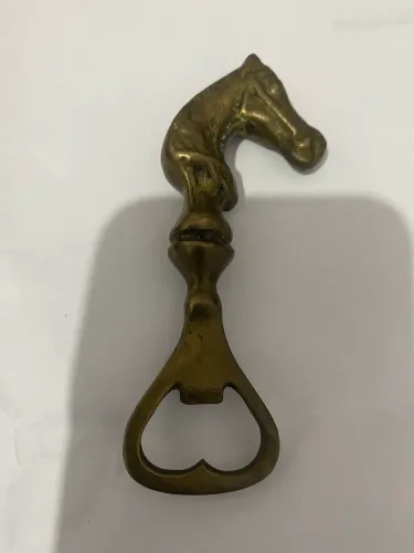 Abridor de garrafa antigo em bronze