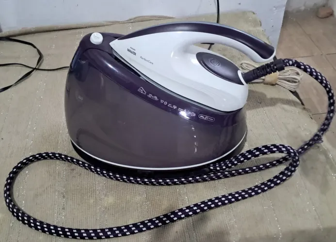 Ferro philips walita perfeitamente Aqua(não queima roupas)  aceito troca por tv