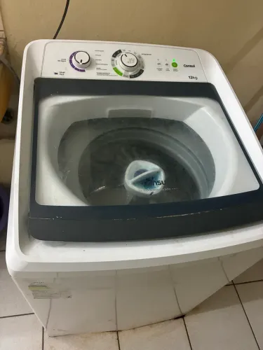Máquina de lavar com defeito