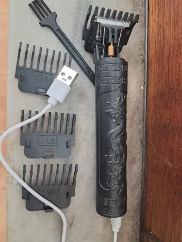 Máquina de cortar cabelo zero só R$50,00