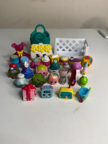 Lote Shopkins + 2 cestinhas