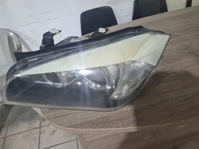 Vendo farol lado esquerdo da bmw x1 2010 a 2014