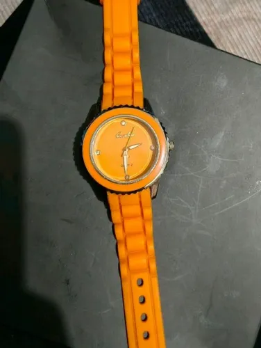 relógio condor laranja, mostrador de 3,5cm e tamanho total da pulseira do relógio de 23cm