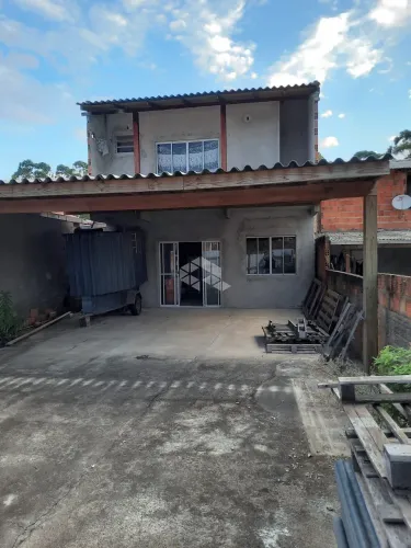 CASA SOBRADO COM 2 DORMITÓRIOS SENDO 1 SUÍTE NO BAIRRO INGLESES DO RIO VERMELHO EM FLORIAN