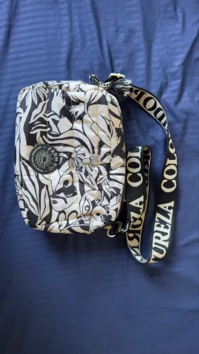 Bolsa farm, impermeável. R$ 100,00