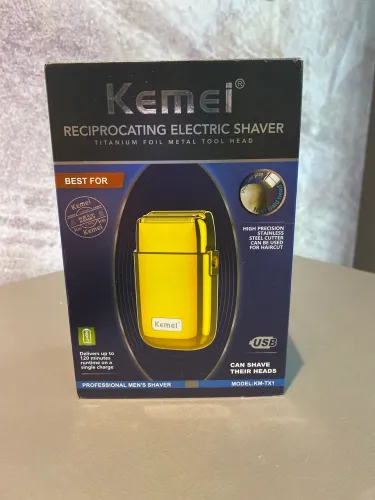 barbeador elétrico portátil Kemei KM-TX1.
