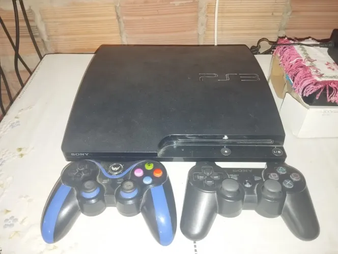 PS3 + 2 controles + 15 jogos físicos