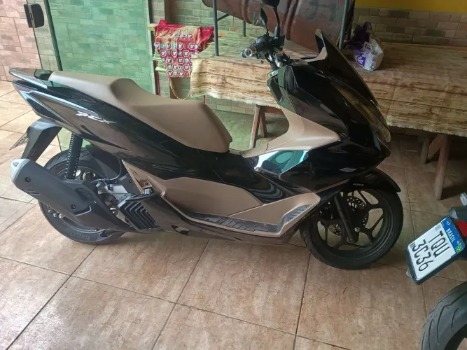 Moto de único dono, 800 km nova