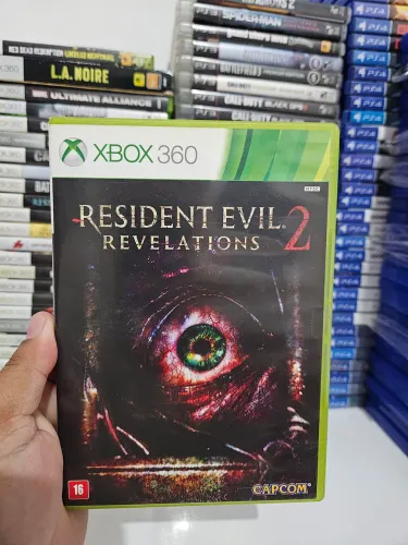 Vendo Resident Evil Revelations 2 de Xbox 360 em perfeito estado de conservação.