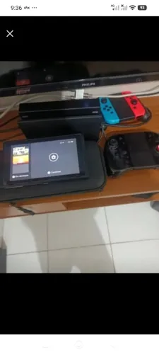 Nintendo switch v1 desb sd 64+32 da interna ,dong pro desb e controle adicional