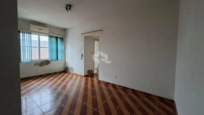 Crédito Real vende apartamento de 2 dormitórios no bairro Menino Deus, em Porto Alegre/RS.