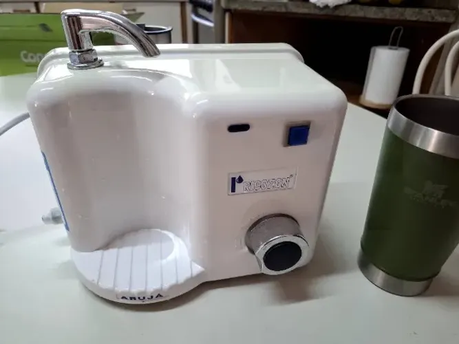 Filtro ozonizador em perfeito estado com refil reserva