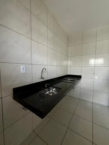 Bancada de Granito verde ubatuba, com fogão cooktop de 4 bocas