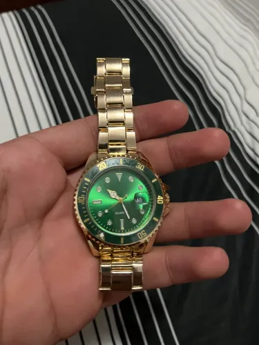 Relógio novo cor ouro verde por dentro