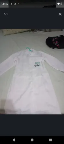 Jaleco novo... Obs: o nome bordado está sobre um bolso pode tirar em qualquer costureira