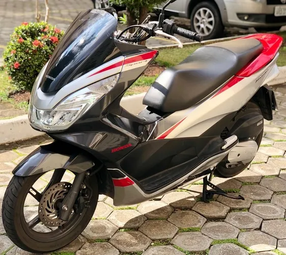 Honda Pcx Sport, baixa km,aceito troca por motos