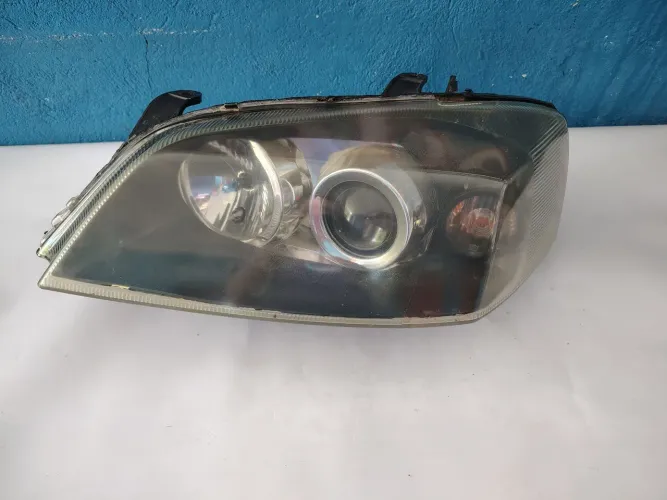 Farol GM Astra lado esquerdo ano 2005 A 2011 usado 
