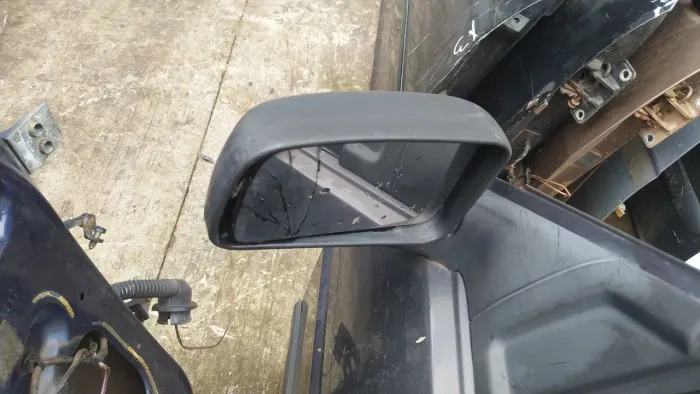 Retrovisor manual lado esquerdo Santana 96/