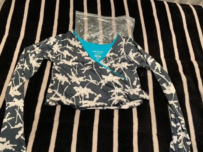 blusa de praia com proteção uv tamanho 10 - UVLINE - nunca usado