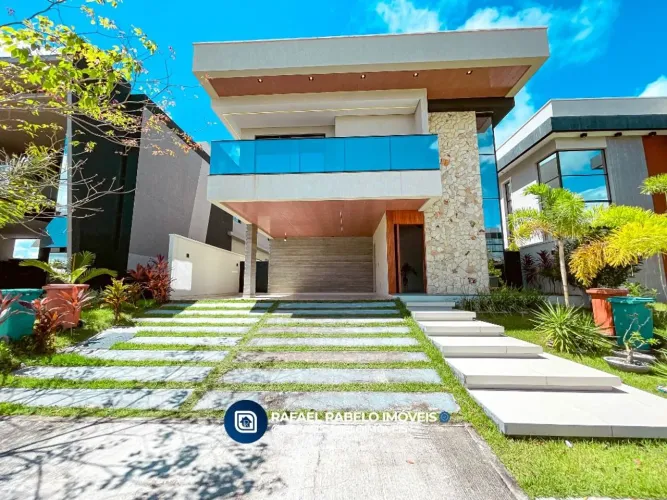 Casa com 4 dormitórios à venda, 303 m² por R$ 2.350.000,00 - Cidade Alpha - Eusébio/CE