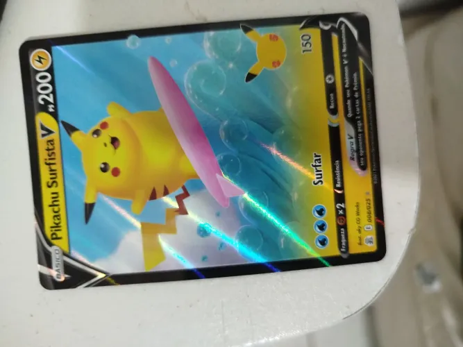 Carta Pokémon Pikachu Surfista Edição celebração de aniversário de 25 anos